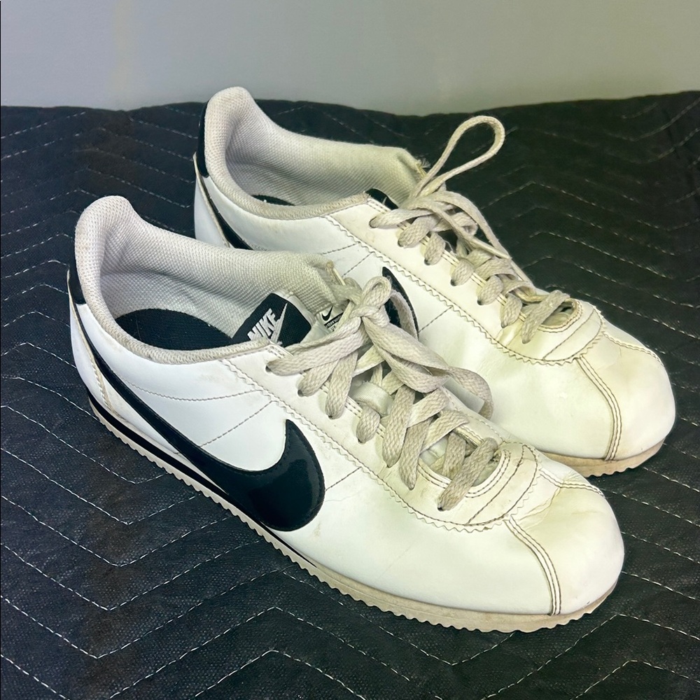 Nike Classic Low-Top White Sneakers with Black Swoosh